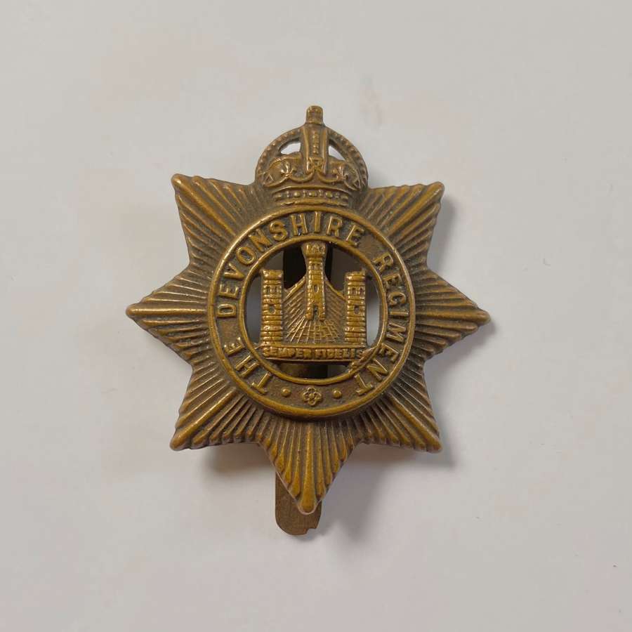 WW1 Devonshire Regiment All Brass Economy Cap Badge.