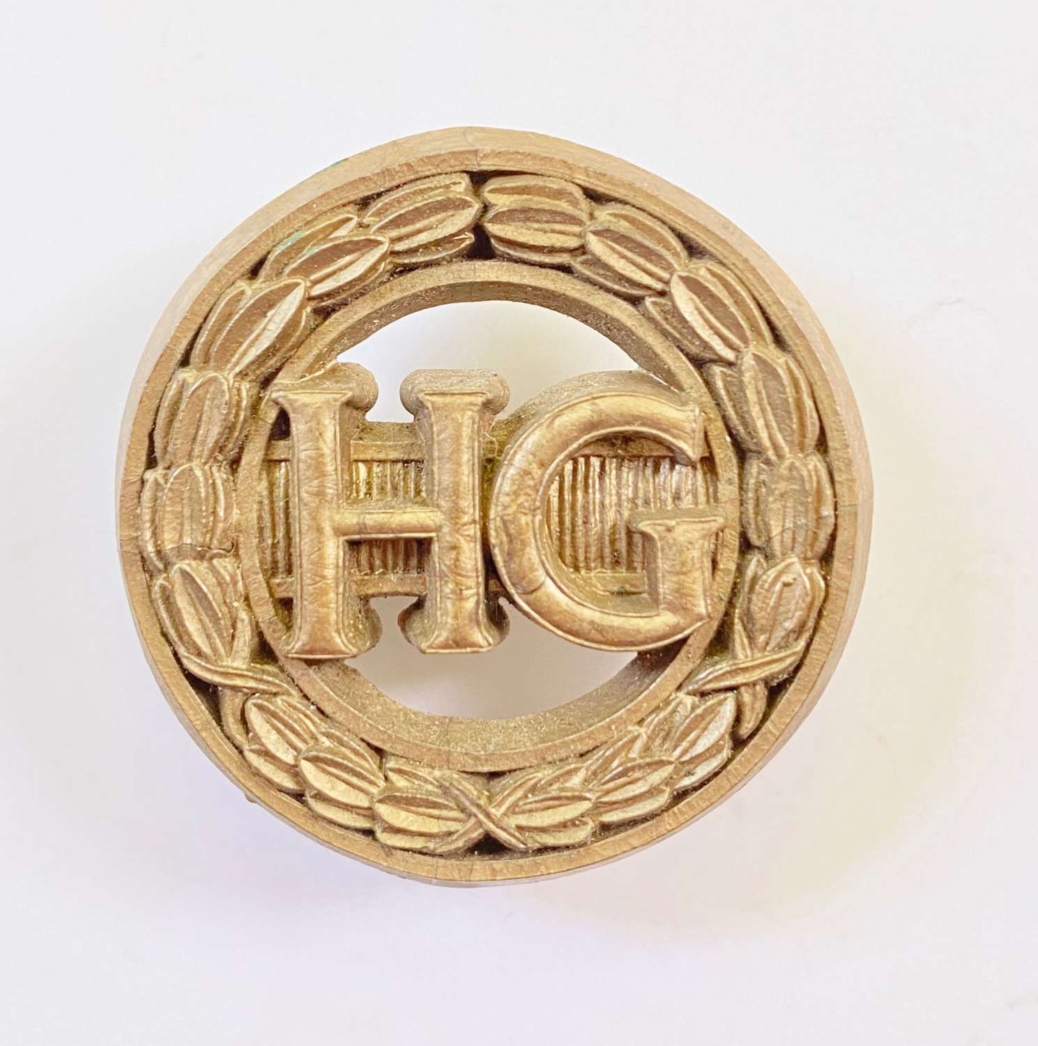 WW2 Woman Home Guard Auxiliary Plastic Economy Issue HG Badge.