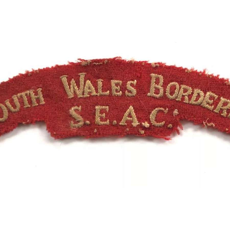 South Wales Borderers SEAC Cloth Shoulder Title Badge.