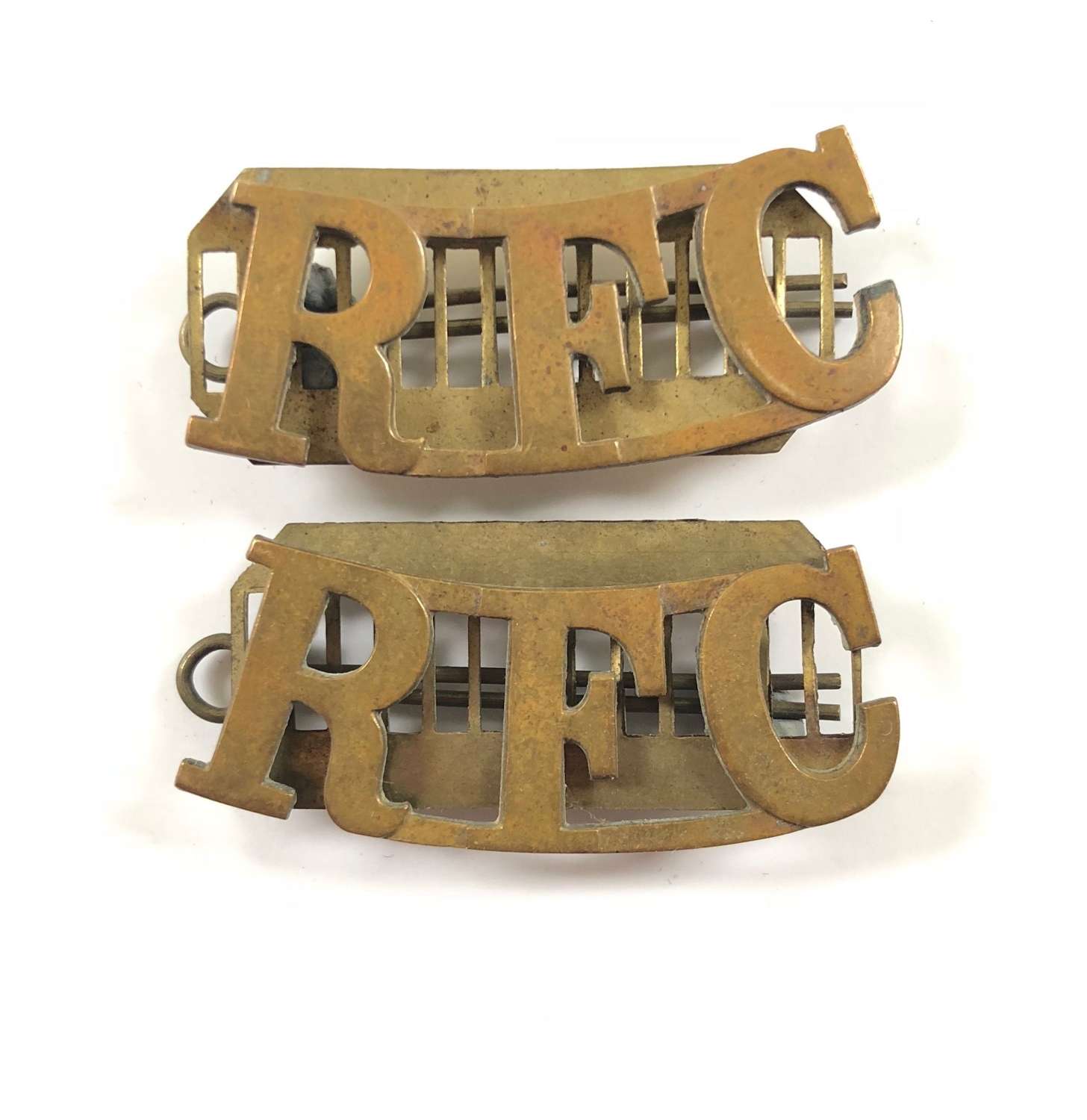 WW1 Royal Flying Corps Pair of Brass Shoulder Title Badges.
