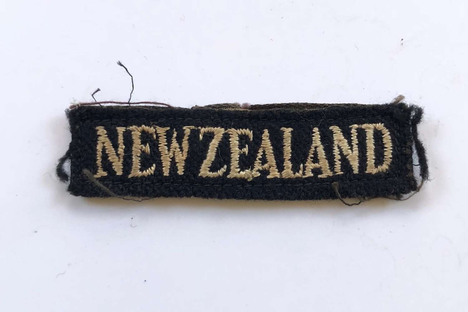 WW2 New Zealand Nationality Title Badge.