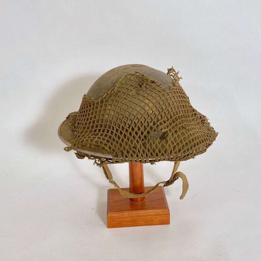 WW2 1940 Tommy Steel Helmet with Original Netting Cover.