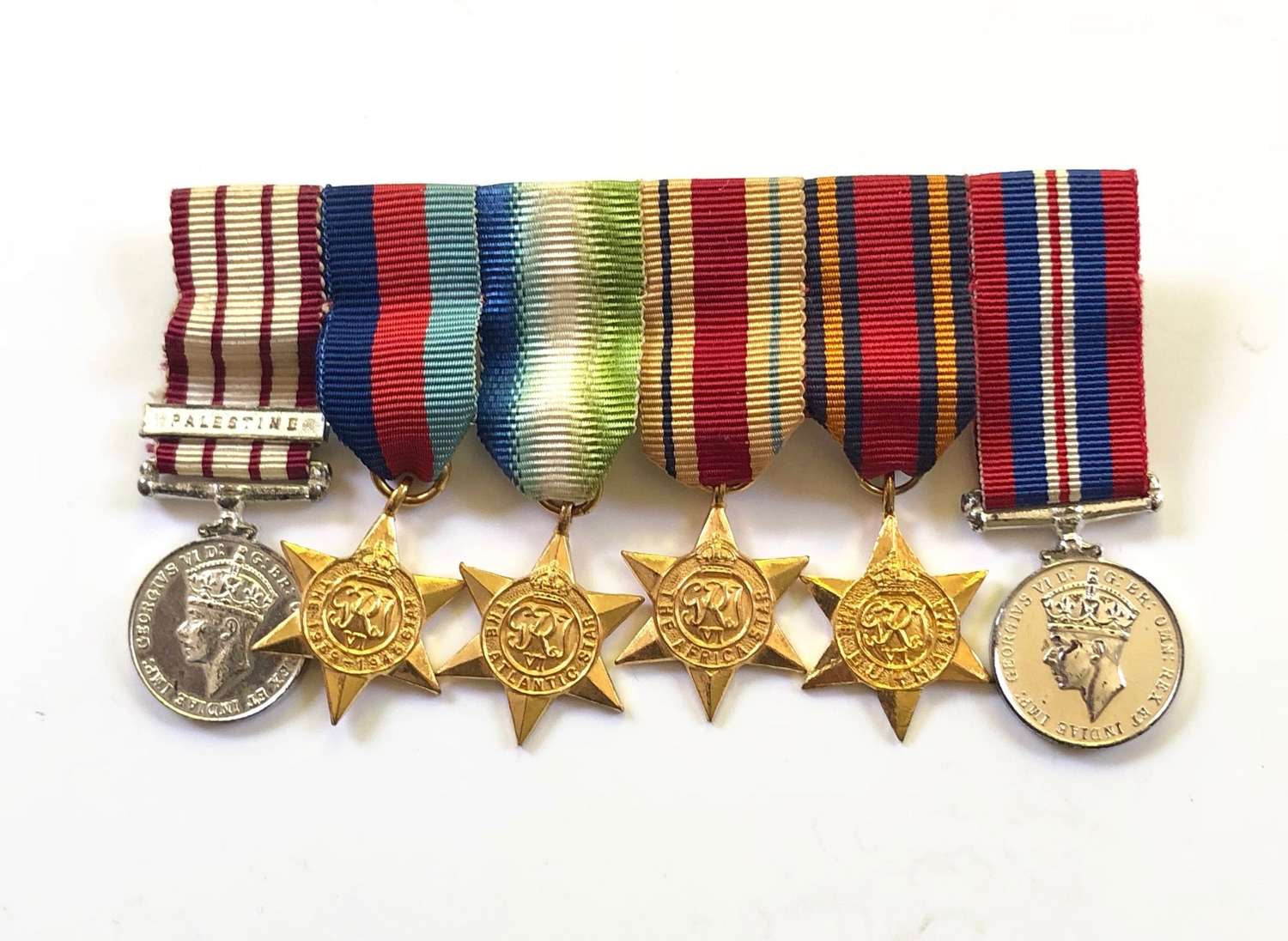 Royal Navy Miniature Medal Group a Worn.