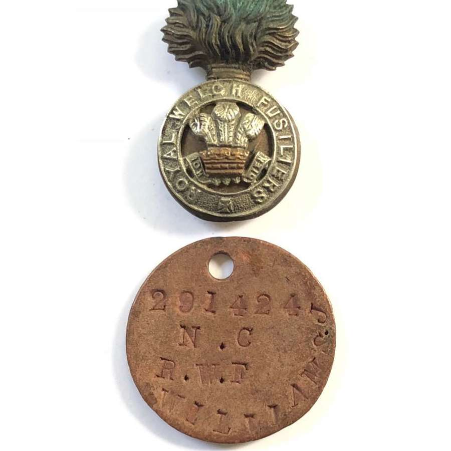 WW1 Royal Welsh Fusiliers Dog Tag and Cap Badge.