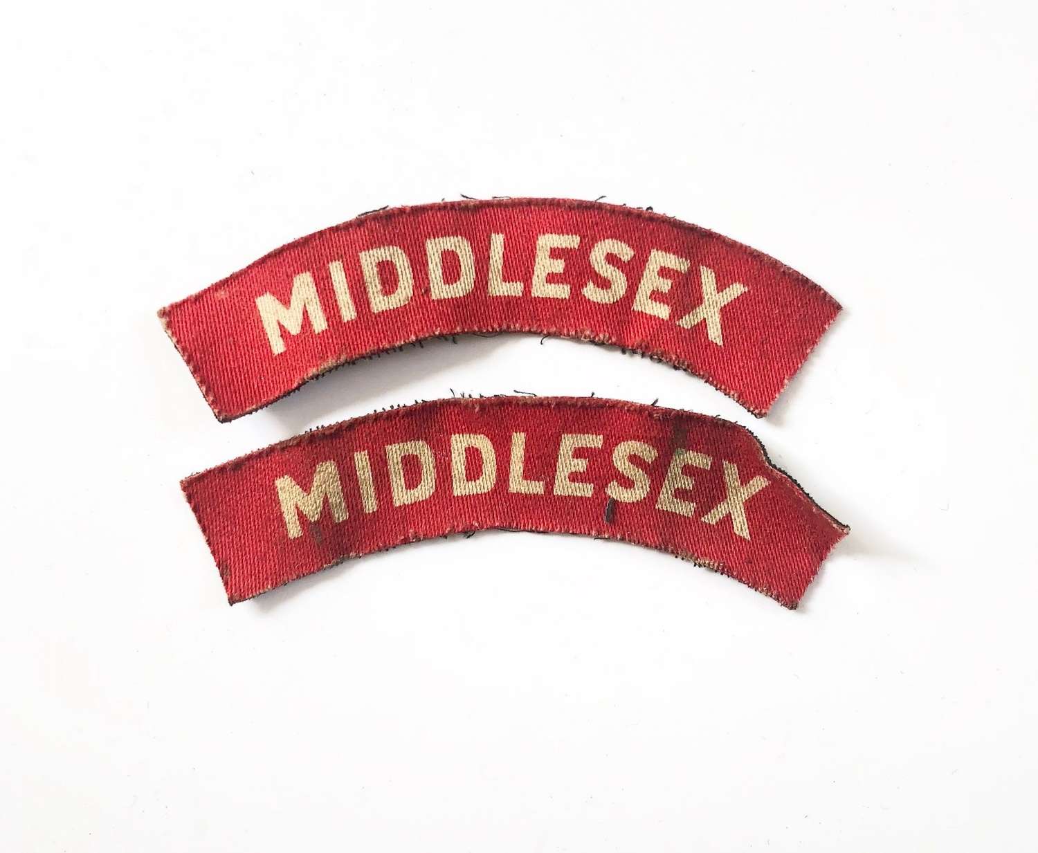 WW2 Middlesex Regiment Printed Cloth Shoulder Titles.