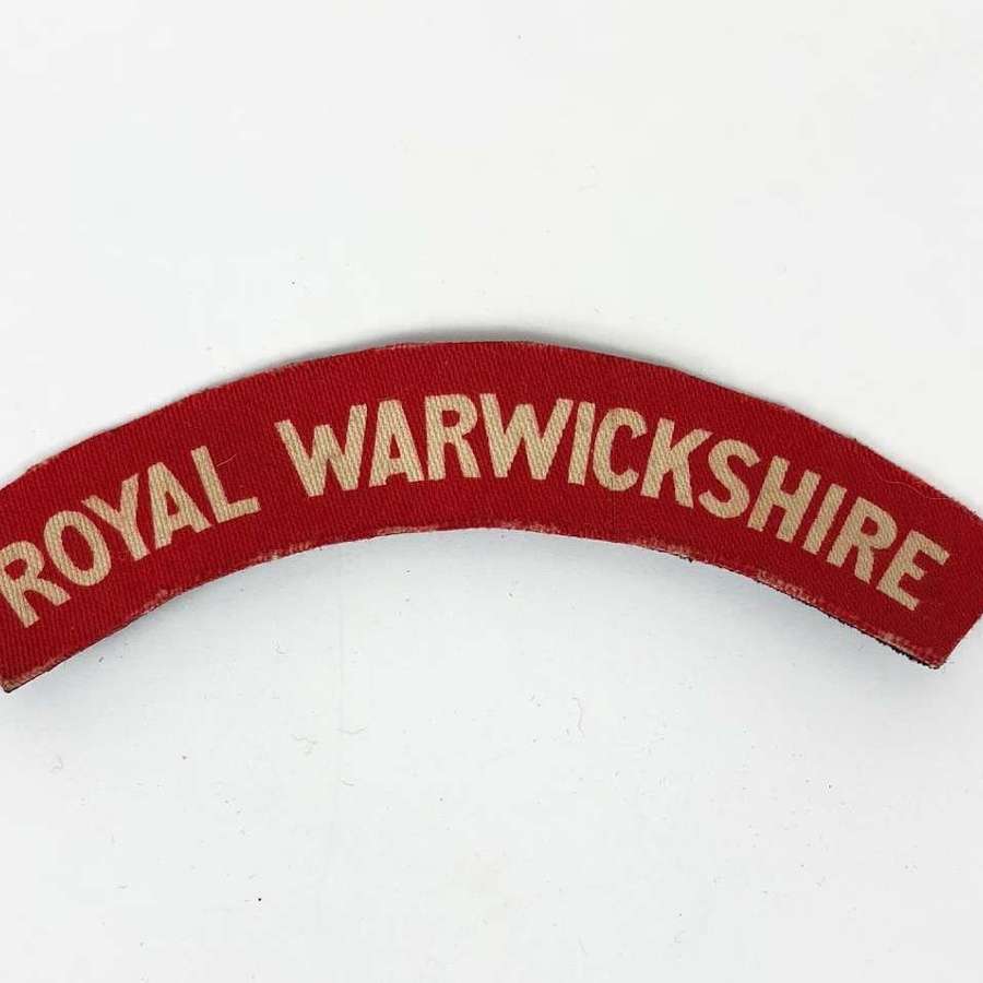WW2 Royal Warwickshire Regiment Printed Shoulder Title Badge.